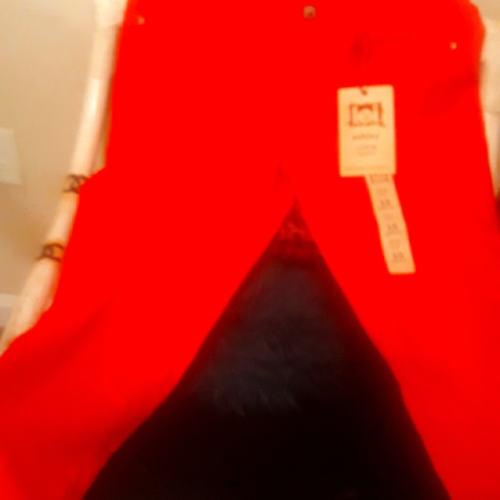 A pair of orange pants nice for summer